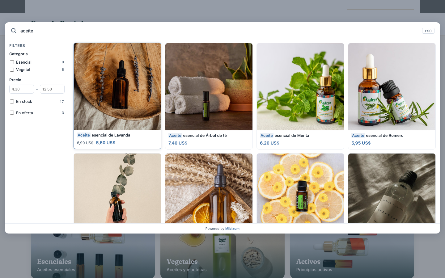 Buscador instantáneo de Mibizum sobre una tienda Magento 2.4.7 real: resultados de «aceite» con imágenes, precio y etiquetas de oferta.